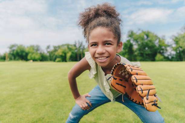 Children using baseball gloves