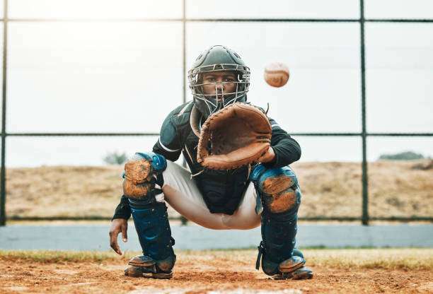 The boy is using a baseball glove