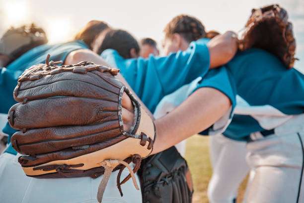 Using a baseball glove in the game