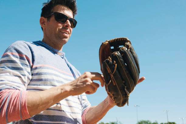 baseball player with baseball glove during summer