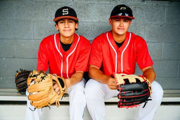 Young Hispanic baseball team and coach, baseball glove