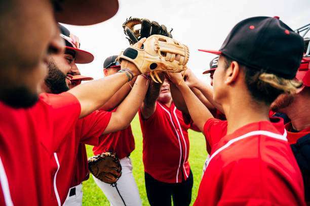 Young Hispanic baseball team and coach, baseball glove