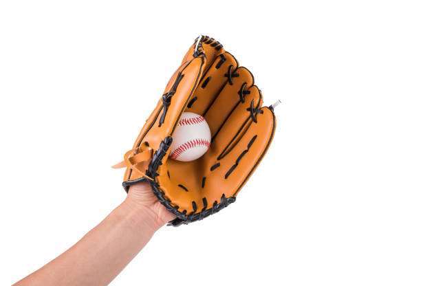 A female baseball glove hand catches ball.
