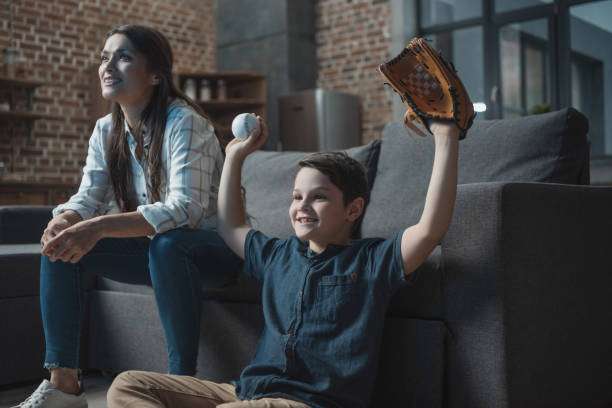 Using a baseball glove in the game