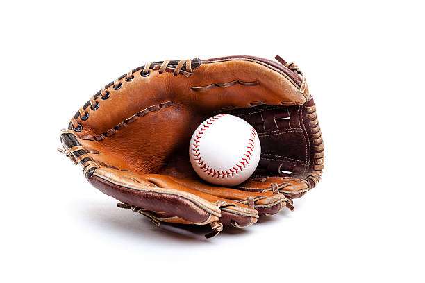 Person swinging a bat at a baseball on a sunny field, ready for their baseball glove.